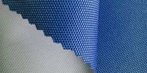 What are the characteristics of PU and PVC coating for raincoat fabrics?