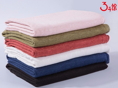 What are the advantages and disadvantages of knitted fabrics?